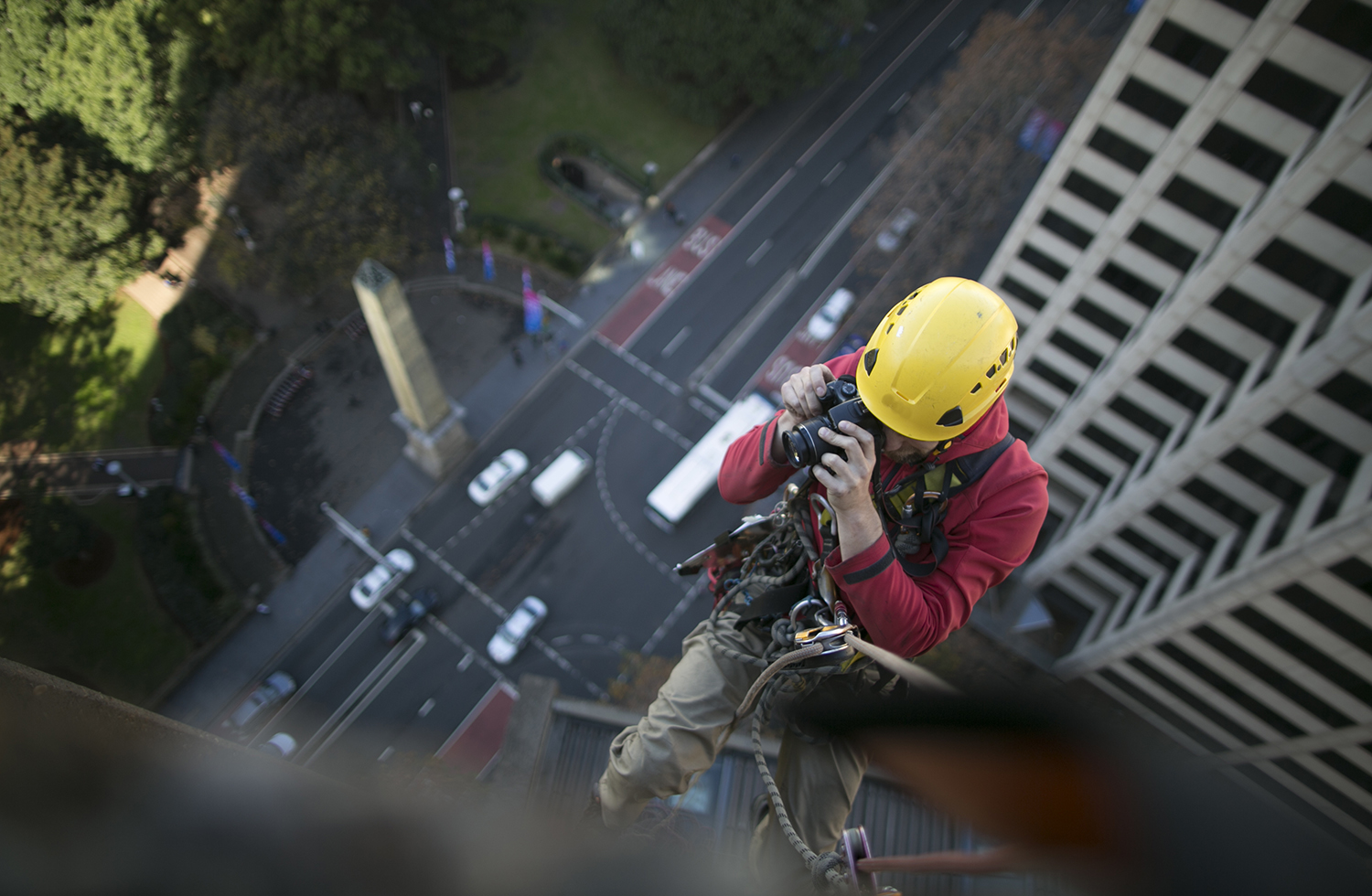 Rope access engineer inspector rappelling, working at height, in